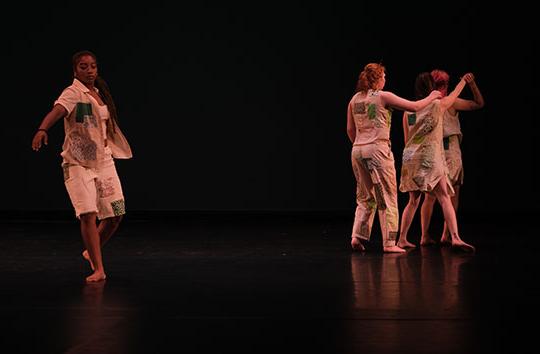 people on stage dancing